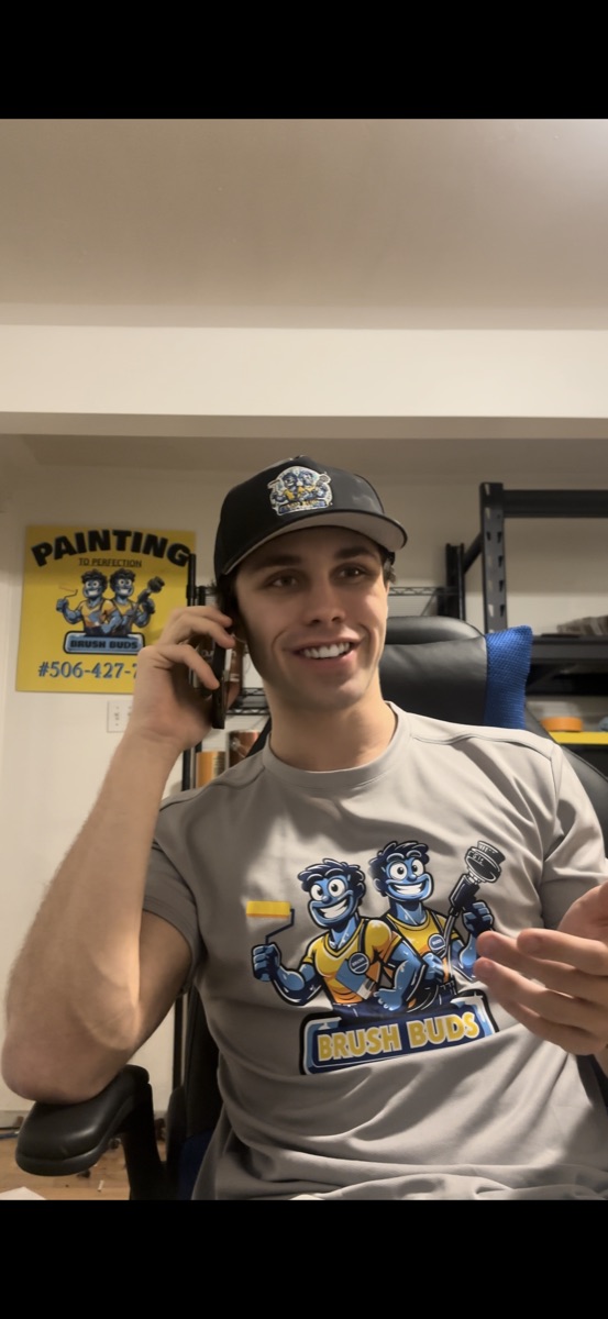 The Brush Buds owner in a branded tee